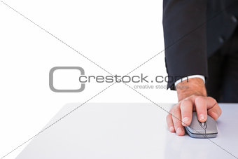 Businessman in suit using mouse