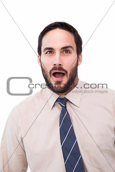 Portrait of shocked businessman with mouth open