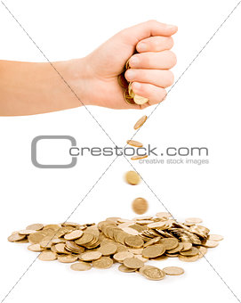 hand holding coins isolated on white.