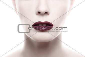 Dark Purple Lipstick on Pale Woman Face