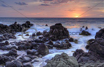 Sunrise and Minamurra volcanic rocks at low tide