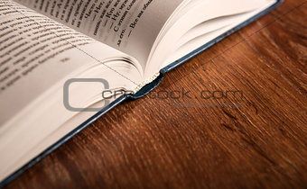 open large book on a wood table