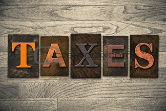 Taxes Concept Wooden Letterpress Type