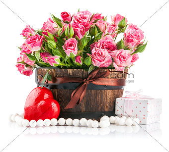 Bunch pink roses with gift to day saint valentine
