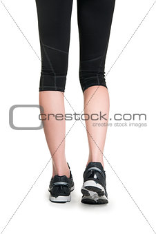 Woman fitness. Runner legs and feet running closeup on shoe