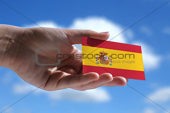 Small Spanish flag against sky