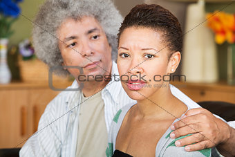Concerned Woman with Spouse