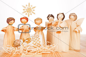 Christmas crib. Light wooden concept.