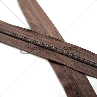 Brown zipper isolated on white background