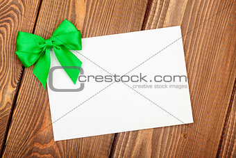 Valentines day greeting card with green bow