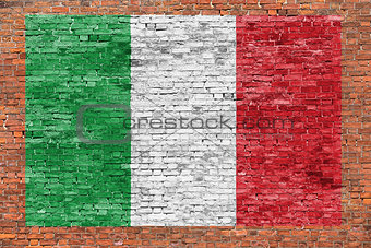 Flag of Italy painted over brick wall