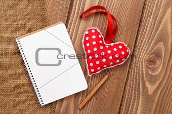 Blank notepad for copy space and vintage handmaded valentines day heart