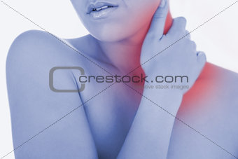 Topless woman massaging neck