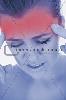 Unhappy woman with severe headache
