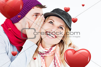 Composite image of handsome man with hat telling a secret to his laughing girlfriend against a white