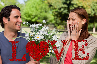 Composite image of young woman holding her hands against her face when presented with flowers