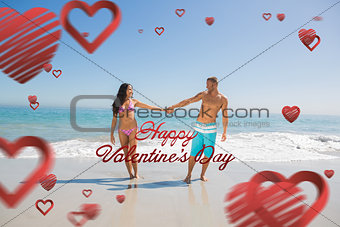 Composite image of handsome man holding his girlfriends hand