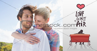 Composite image of smiling couple standing outside together