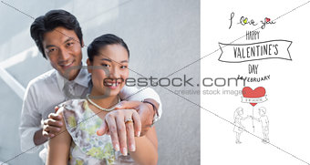Composite image of couple showing engagement ring on womans finger