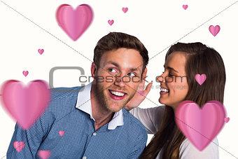 Composite image of happy young woman whispering secret into friends ear