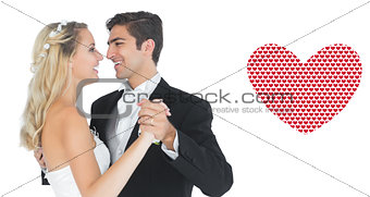 Composite image of sweet married couple dancing viennese waltz