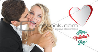 Composite image of handsome bridegroom kissing his wife on her cheek