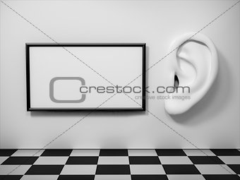 Ear in tte wall with banner. Listening concept.