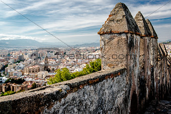 Part of Gibralfaro fortress (Alcazaba de Malaga) and view of Malaga city