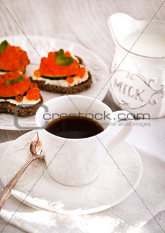 Romantic breakfast with coffee and toasts