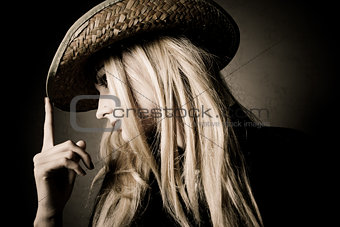 blond woman in hat