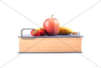 Back to school fruit on a book