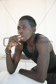 Smoking young african man