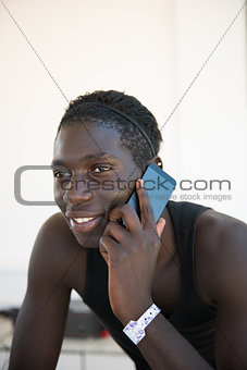 young african man using phone