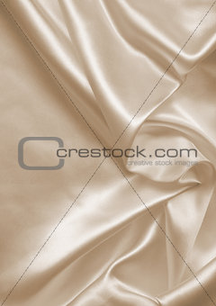 Smooth elegant golden silk as wedding background. In Sepia toned