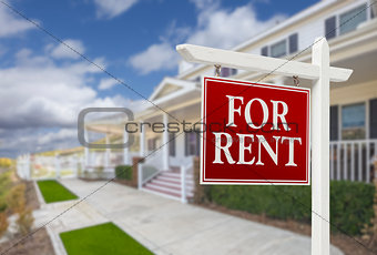 For Rent Real Estate Sign in Front of House