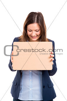 Business woman holding a cardboard