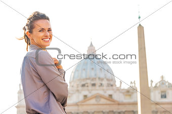Portrait of happy young woman on piazza san pietro in vatican ci