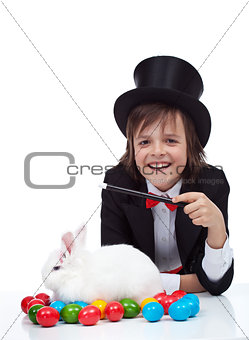 The magic of easter - happy magician boy and grumpy rabbit
