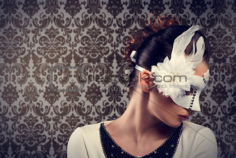 carnival girl with white mask