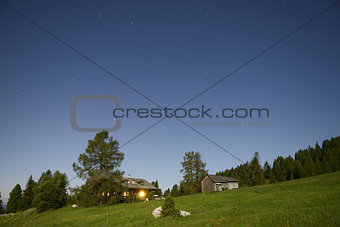 Starry sky over the mountain hut