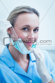 Smiling young female dentist
