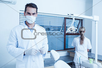 Male dentist wearing surgical mask