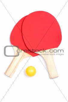 Ping pong paddles and yellow ball