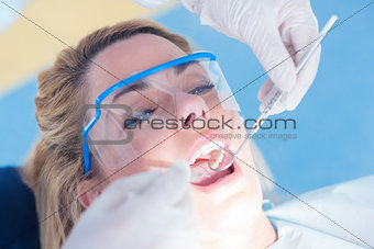 Close up of a patient with mouth open under the light