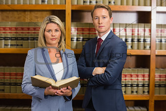 Team of lawyers in the law library
