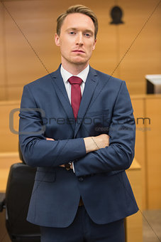Serious lawyer looking at camera