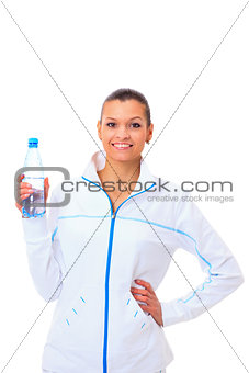 Beautiful fit mixed race female model holding a bottle of water