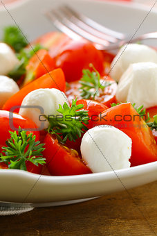 Italian salad with tomatoes and mozzarella (caprese)