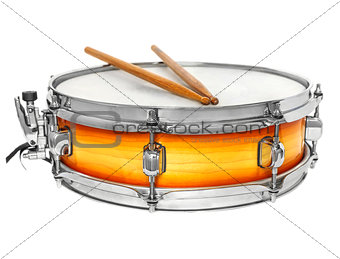 Sunburst snare drum with drumsticks