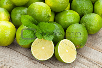 Fresh ripe limes with mint